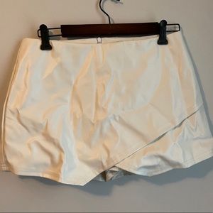 White leather shorts